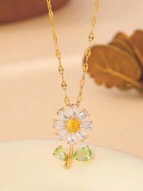 Gold Daisy Pendant Necklace with Yellow Center and Green Leaves
